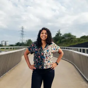 Milly Hennayake, female civil engineer, smiles at camera