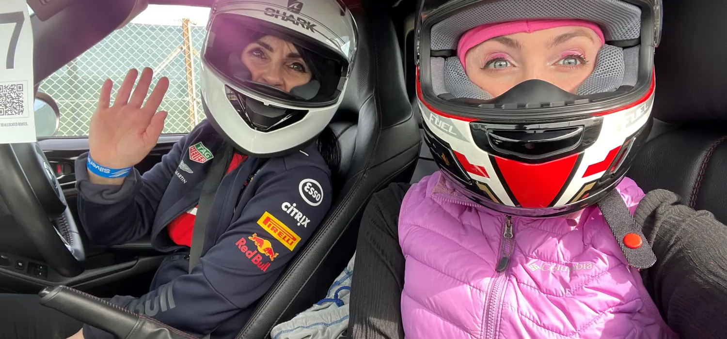 Kim Everitt, transport systems engineer, in race car.